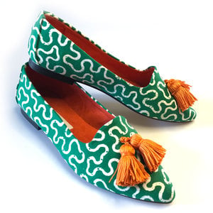 green and white patterned loafers